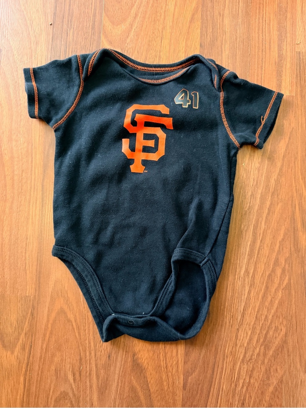 Genuine Merchandise Black & Orange SF Logo Infant One-Piece Bodysuit